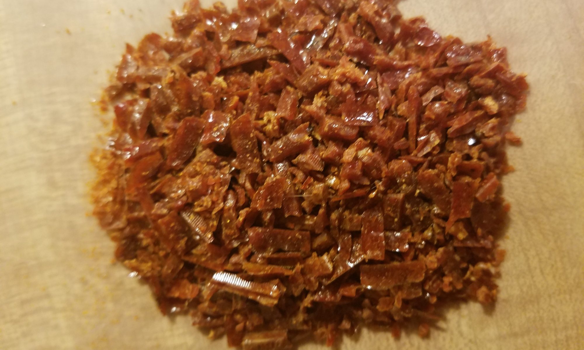 7-12-2017 A pile of propolis collected, crumbled, and ready for use.